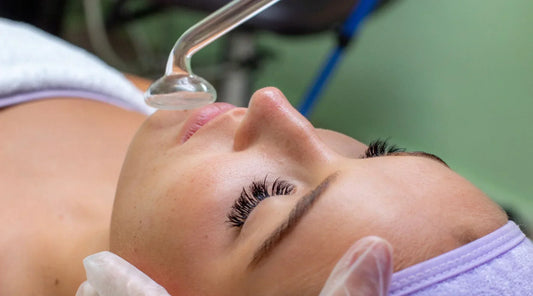 High frequency wand with illustrated benefits for enhanced wellness