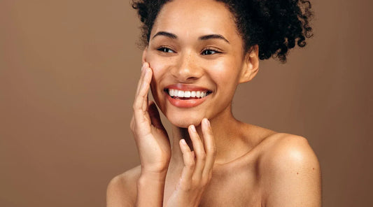 Woman showing even skin tone after skincare treatment