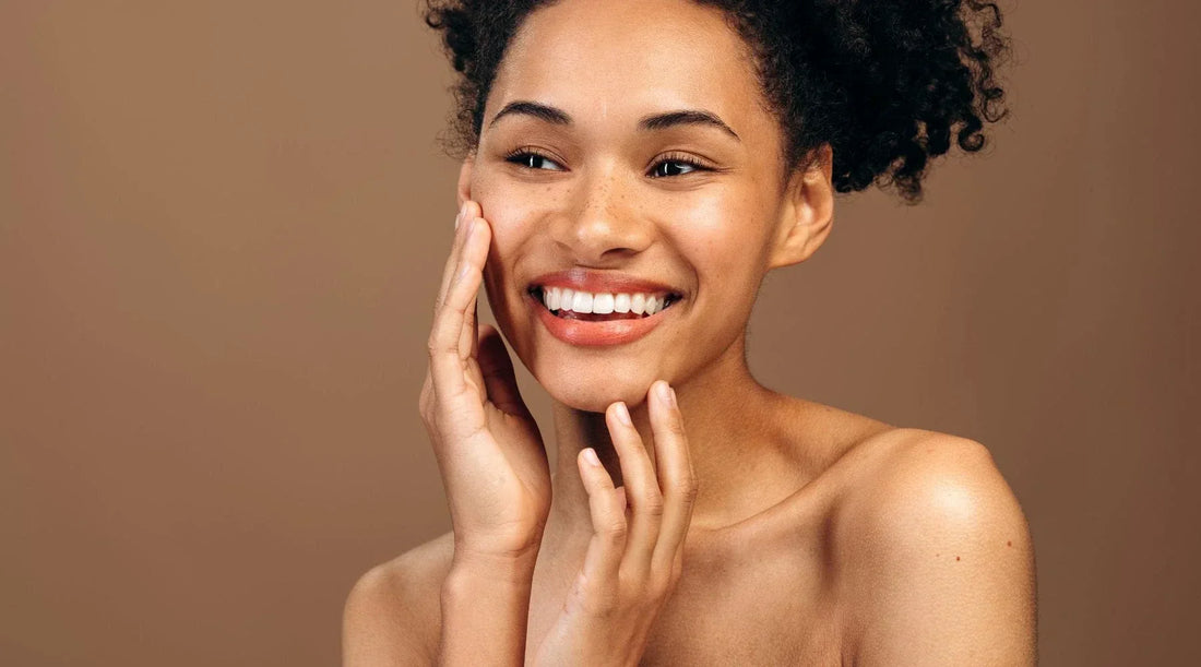 Woman showing even skin tone after skincare treatment